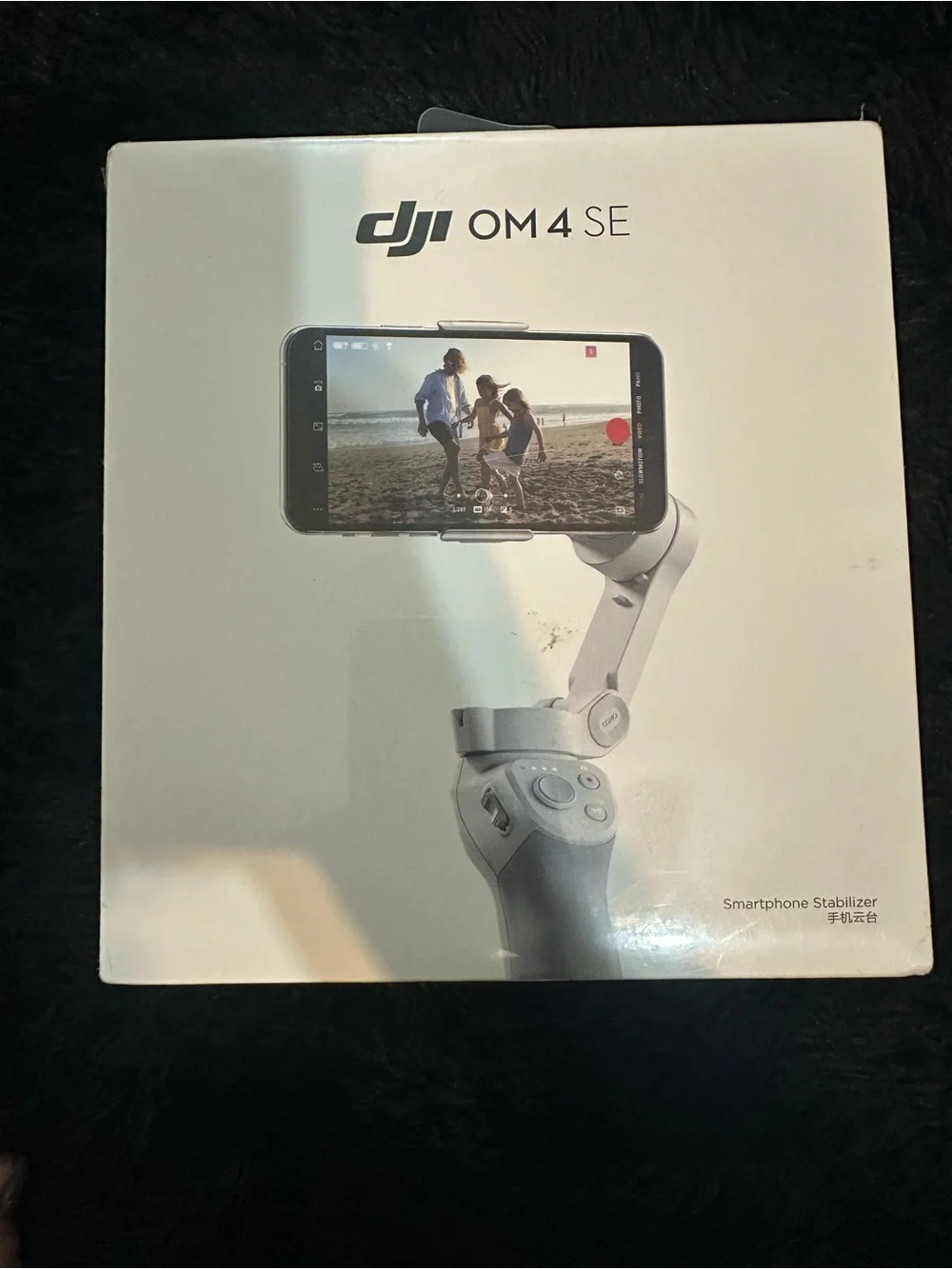 DJI white smartphone gimbal stabilizer